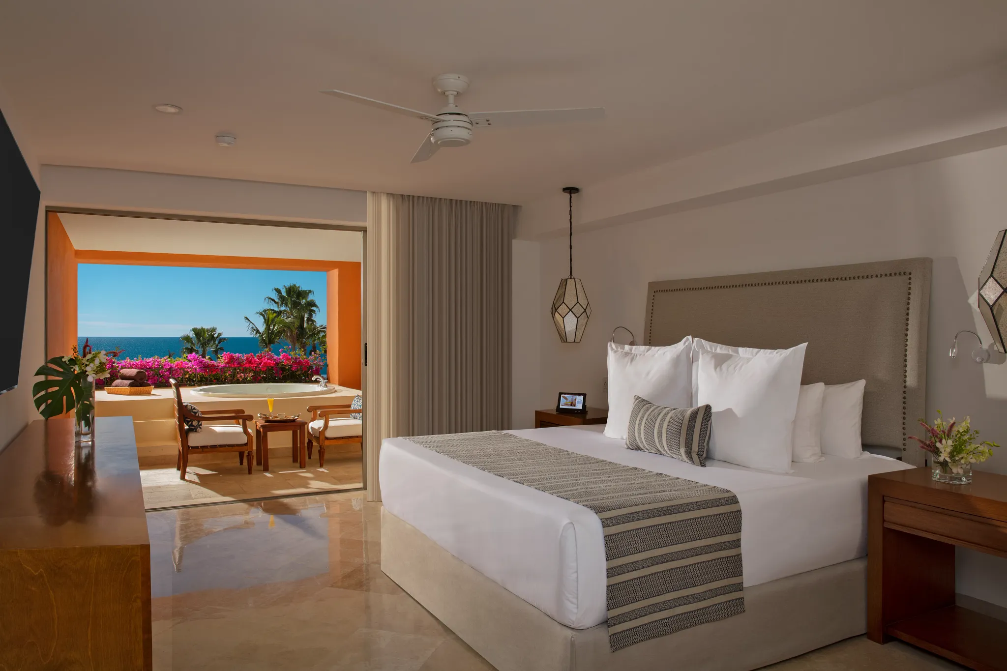 Deluxe Ocean View Room with king bed and terrace hot tub at Zoëtry Casa del Mar Los Cabos.