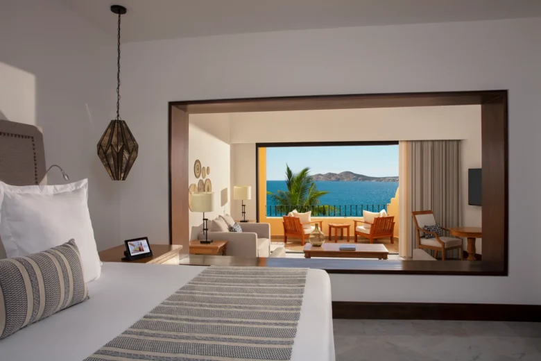 Honeymoon Suite ocean view bedroom with king bed and private terrace at Zoëtry Casa del Mar Los Cabos.
