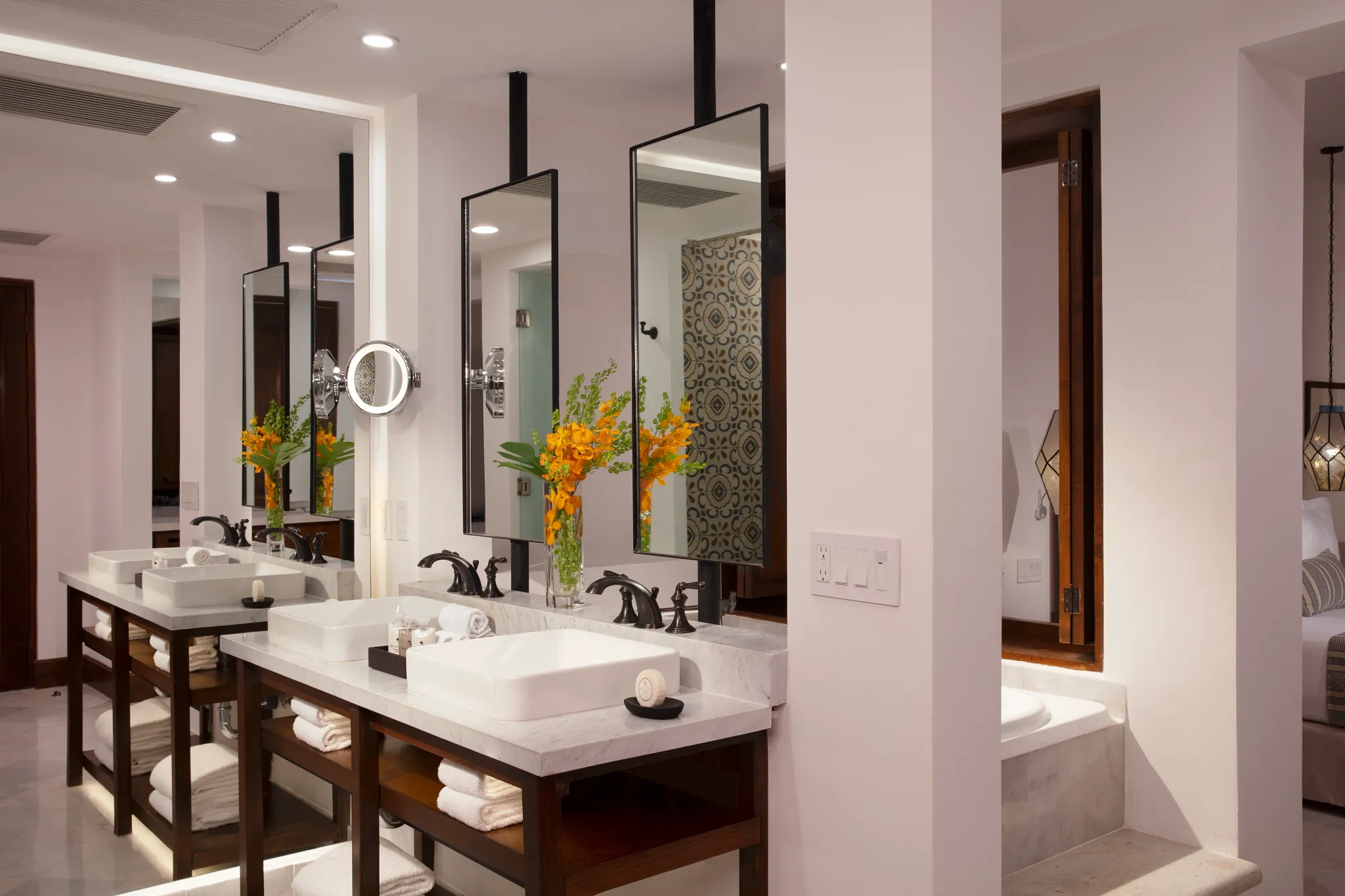 Junior Suite Ocean View bathroom with double vanity and rain shower at Zoëtry Casa del Mar Los Cabos.