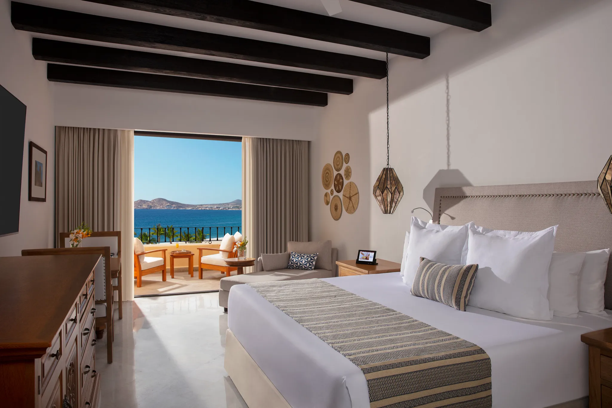 Junior Suite Ocean View with king bed and balcony at Zoëtry Casa del Mar Los Cabos.