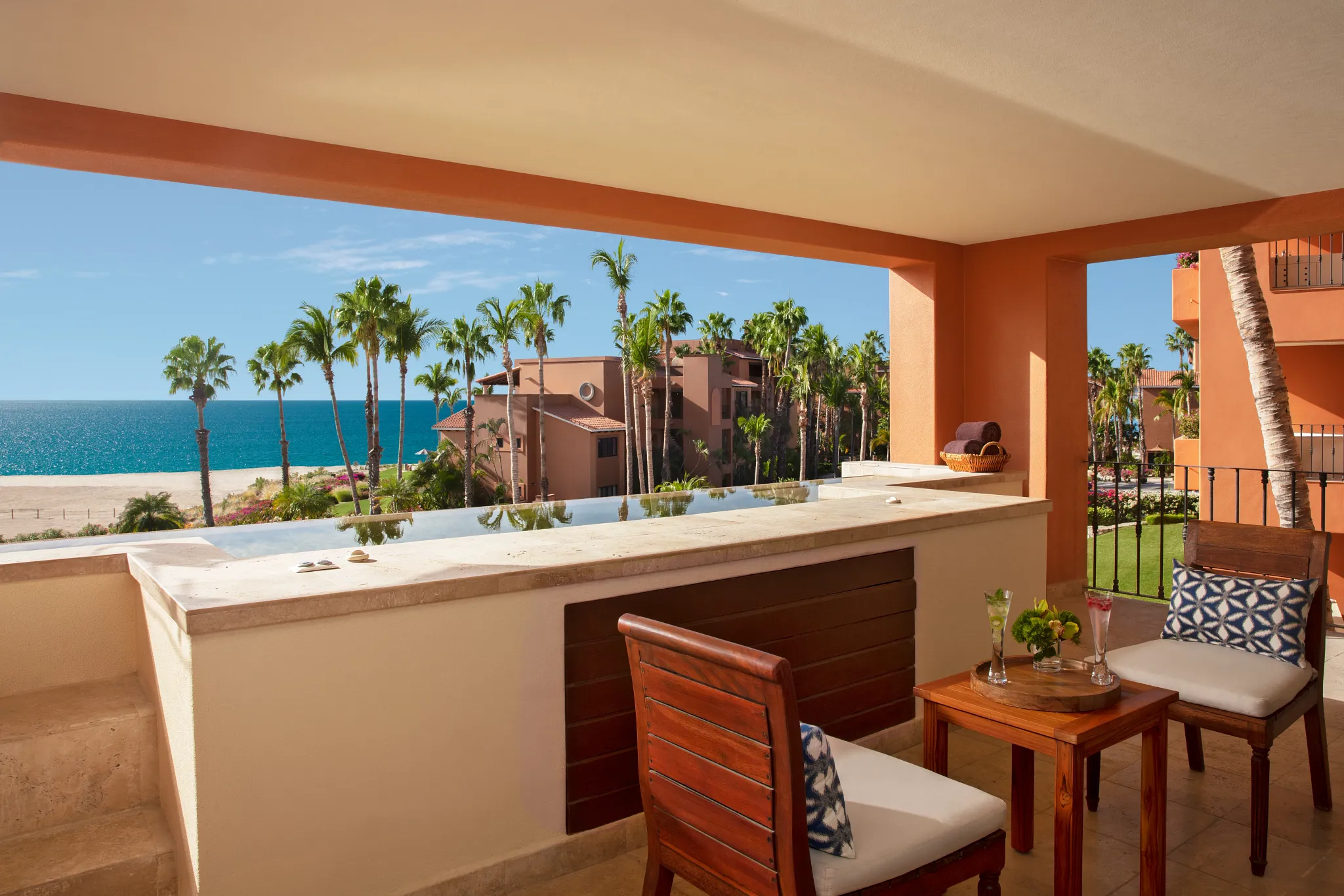 Luxury One Bedroom Suite balcony with infinity-edge plunge pool and ocean view at Zoëtry Casa del Mar Los Cabos.