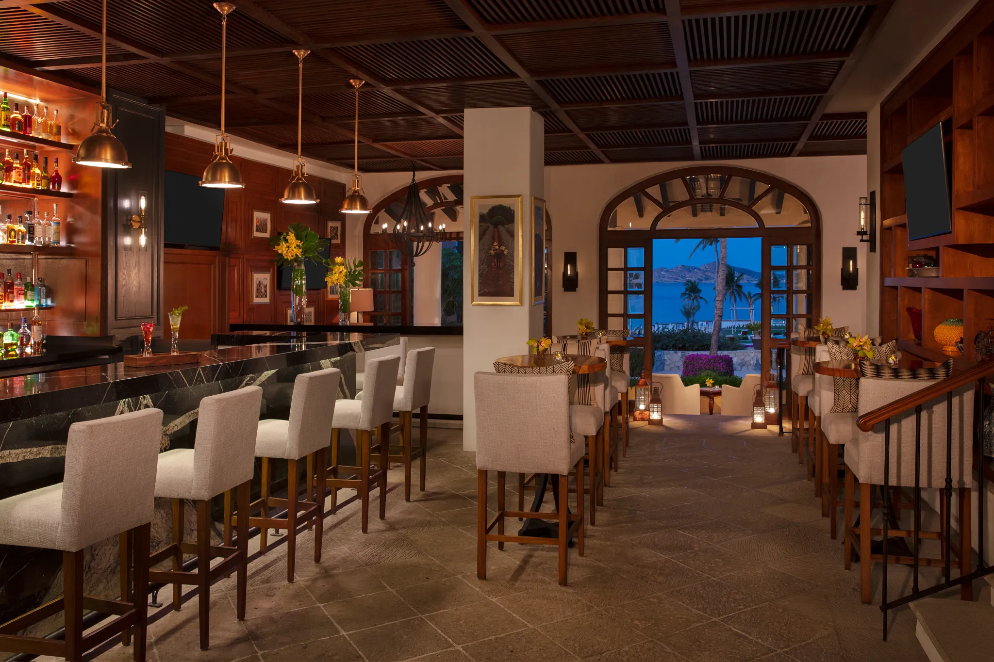 Maguey Bar at Zoëtry Casa del Mar Los Cabos featuring an elegant open-air bar, handcrafted cocktails, and serene oceanfront ambiance.