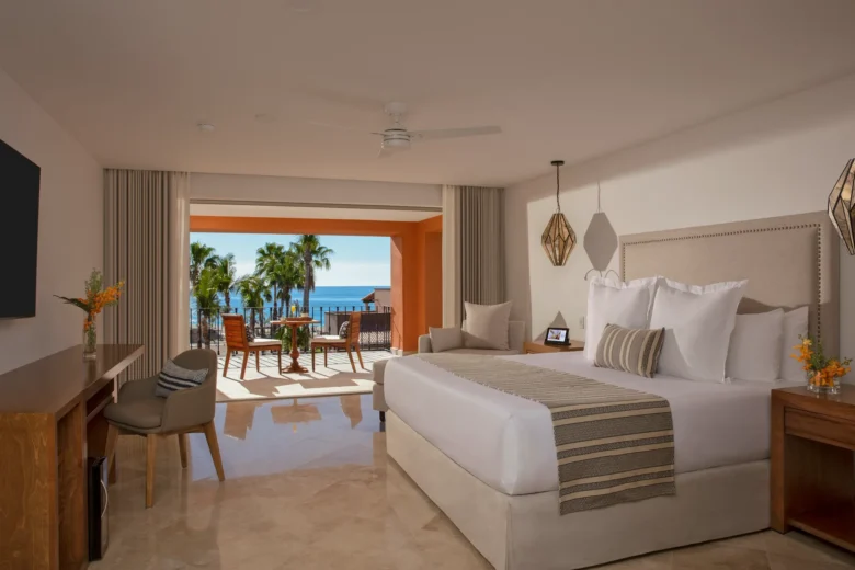 One Bedroom Suite ocean view bedroom with king bed and private terrace at Zoëtry Casa del Mar Los Cabos.