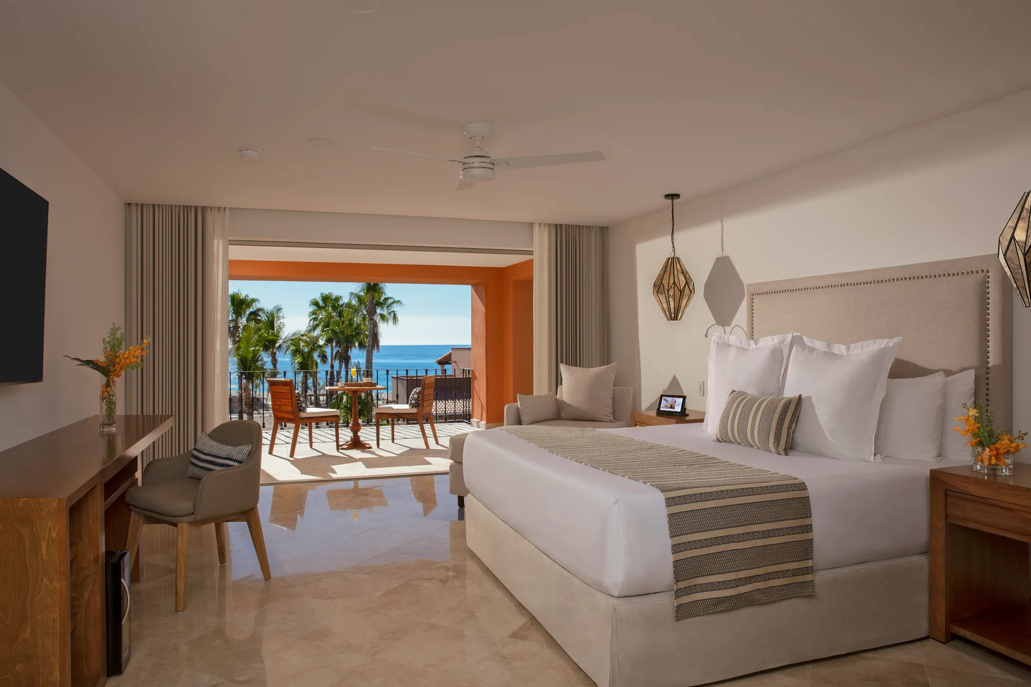 One Bedroom Suite ocean view bedroom with king bed and private terrace at Zoëtry Casa del Mar Los Cabos.