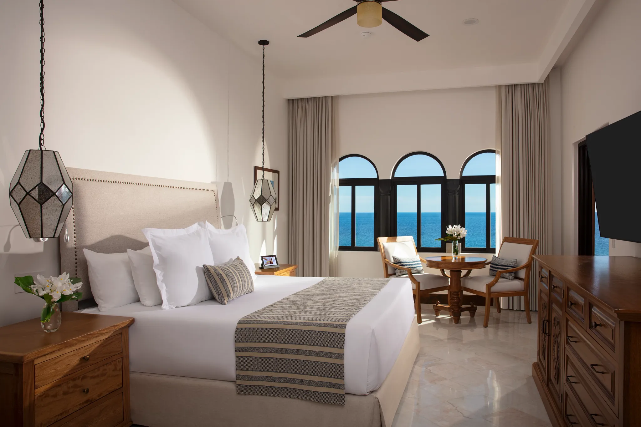 One Bedroom Suite Oceanfront with king bed at Zoëtry Casa del Mar Los Cabos featuring direct Sea of Cortez views and elegant Mexican décor.