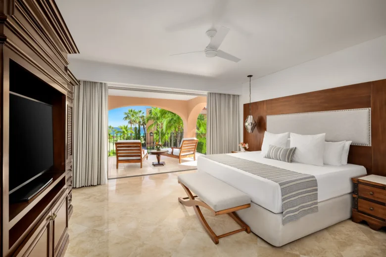Presidential Two Bedroom Suite ocean view bedroom with king bed and private terrace at Zoëtry Casa del Mar Los Cabos.
