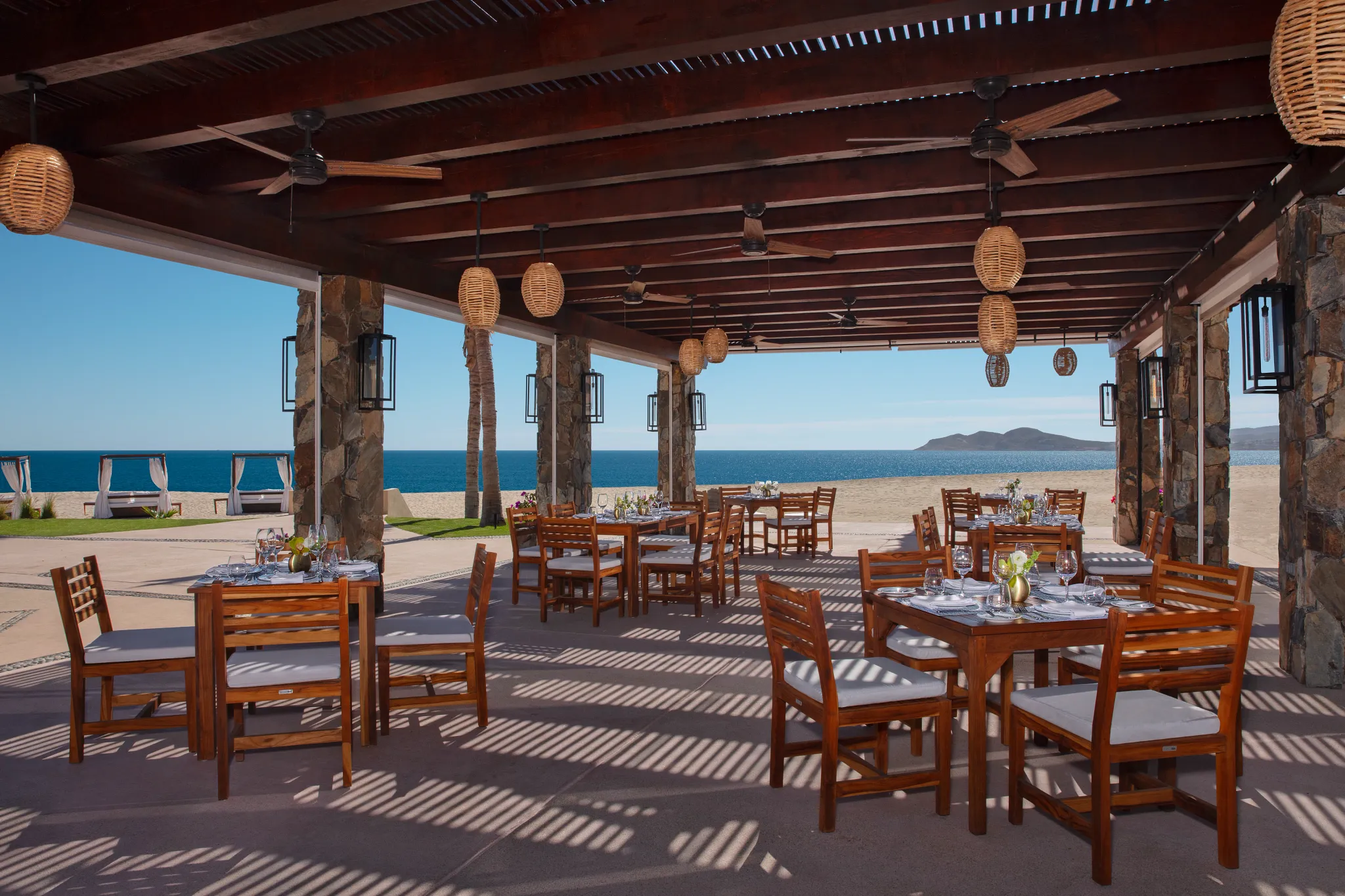 Saltwater restaurant at Zoëtry Casa del Mar Los Cabos featuring oceanfront dining, fresh seafood cuisine, and an elegant open-air coastal setting.